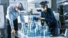 Man and woman using augmented reality headsets